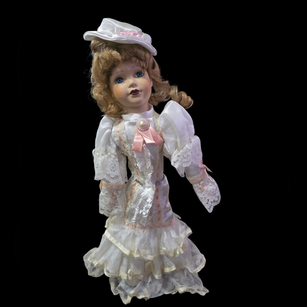 Elegant White and Pink Porcelain Doll